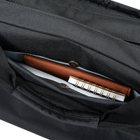 Maletín para portátil Targus, bolsillo, primer plano, negro sobre fondo blanco.